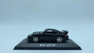 Modelo De Coche PORSCHE 911 GT2 NEGRO - MINICHAMPS - ESCALA 1:43 Con Base - Imagen 1 de 8
