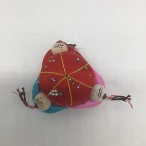 Vintage Asian Chinese Sewing Pin Cushion 3 People Around Red Silk W/Old Pins - Picture 1 of 6