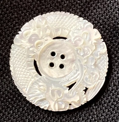 ANTIQUE CARVED SHELL BUTTON WITH DRAGON BORDER - Image 1 of 3