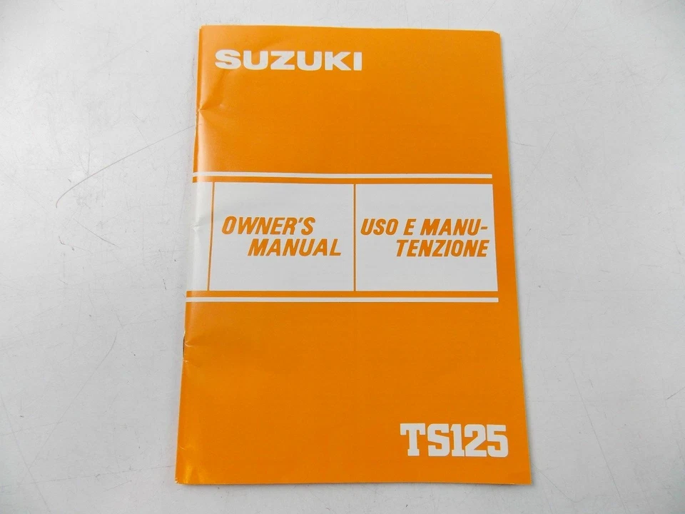 OEM 1983 SUZUKI TS125 LIBRO MANUAL DEL PROPIETARIO INGLÉS ITALIANO 99011-48021-026 Foto 1 de 1