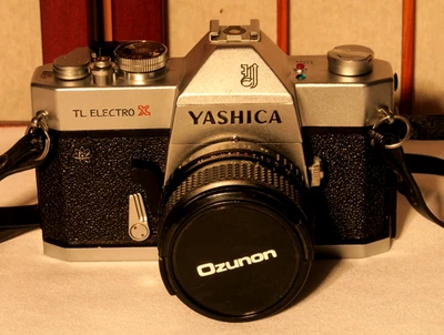 YASHICA TL ELECTRO X 35mm SLR FILM CAMERA w/TOU/FIVE STAR 28MM 1:2.8 LENS - Image 1 of 4