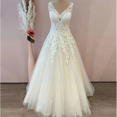 Encantadores Vestidos de Novia Línea A Sin Mangas Cuello en V Lujosos Nuevos Apliques  Foto 1 de 4