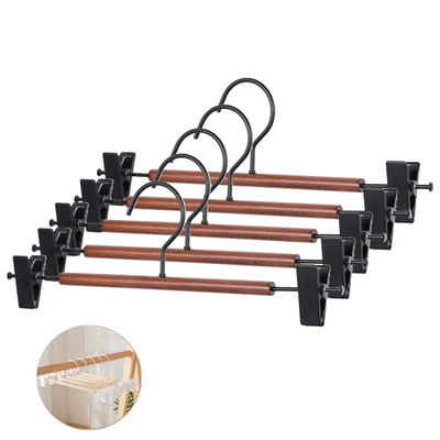 Paquete de 5/10 perchas para pantalones de madera maciza de haya con clips antideslizantes ajustables sin marcas Foto 1 de 4