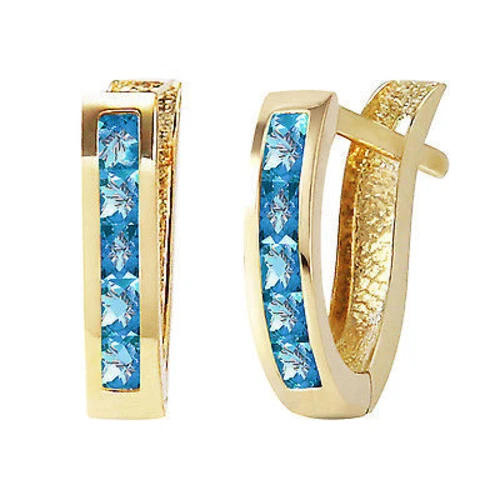 Pendientes Huggie ovalados de oro macizo de 14K de 1,2 quilates de topacio azul Foto 1 de 4