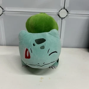 Juguete de peluche Pokémon Guiñando un ojo Bulbasaur - Imagen 1 de 5