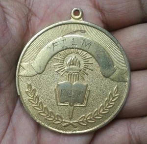 PAKISTAN INDIA FILM 2 PCU MEDAL WITH BURNING LAMP 34.34 GRAMS 47.5 MM - Picture 1 of 2