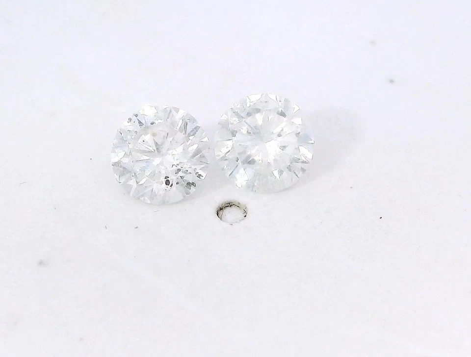 Diamante natural suelto redondo E, I1 4,75 mm a juego de 0,39 quilates cada uno (0,78 quilates en total) Foto 1 de 4