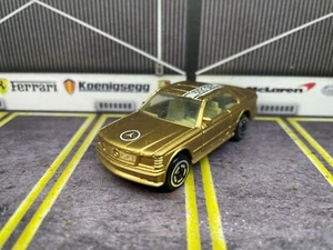 RACING CHAMPIONS MERCEDES BENZ 500 SEC GOLD 1989 1:64 52 - Picture 1 of 8