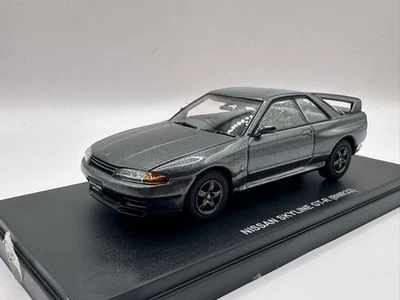 Kyosho 03221G 1/43 Nissan Skyline GT-R Pistola Gris Metálico Modelo Coche con Caja Foto 1 de 4
