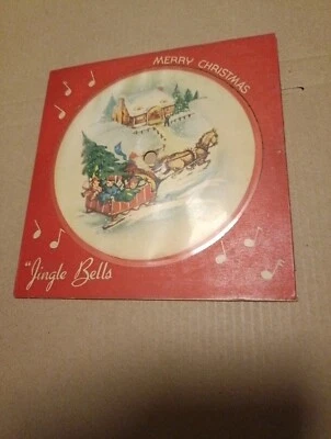 Merry Christmas/ Jingle Bells.     - Image 1 of 2