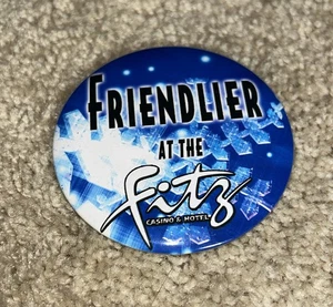 Vintage FRIENDLIER AT THE FITZ Button FITZGERALD CASINO / HOTEL Las Vegas - Picture 1 of 2