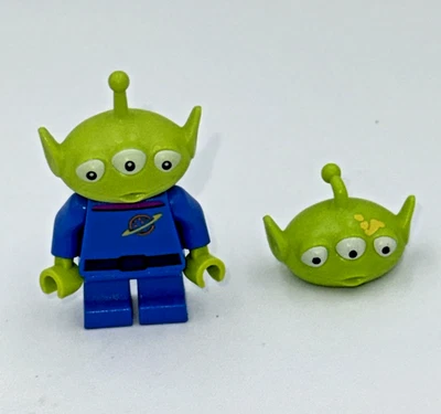 LEGO Toy Story Alien Minifigura Cuello Magenta y Mancha Amarilla en la Cabeza de la Cara Foto 1 de 4