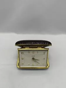Sveglia da viaggio vintage Elgin quadrante luminoso cassa pelle MCM Germania LEGGI - Foto 1 di 12