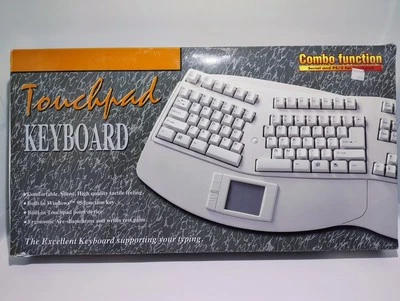 Ortek  EKB-804TP Ergonomic Vintage 104-key w Touchpad NEW DIN or PS/2 Serial - Image 1 of 3