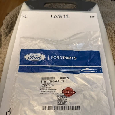 2010-2013 FORD TRANSIT CONNECT SIDE BRACKET COVER NEW OEM 9T1Z-17B814-AB - Image 1 of 2