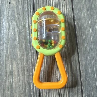 Bolas de lunares Wondertreats naranja verde sonajero tú Foto 1 de 3