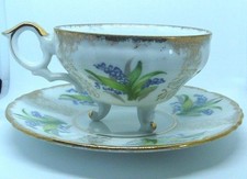 New listing
Vintage 3 footed tea cup and saucer pink blue flowers and with gold trim
