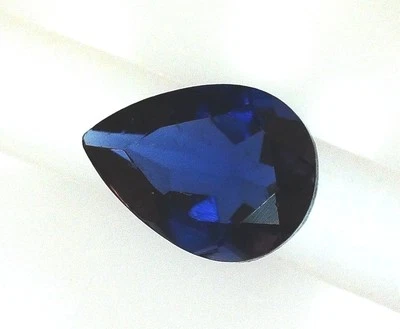 EGL USA CERTIFIED NATURAL IOLITE DARK BLUE 0.58 CT. PEAR SHAPE - Image 1 of 3