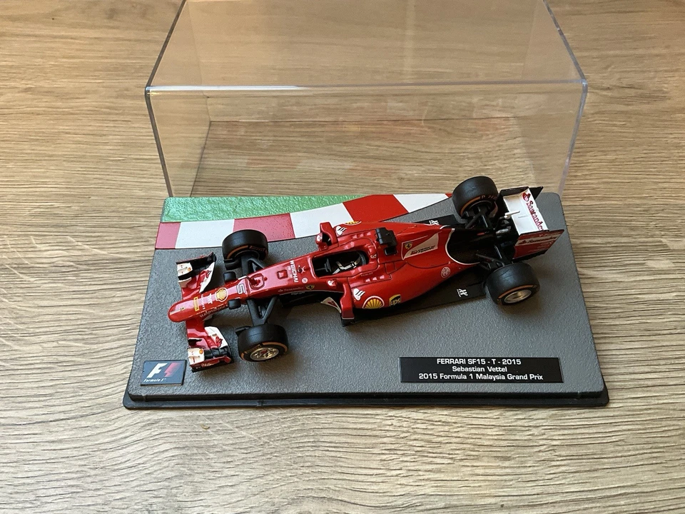 Panini 1/43 Sebastian Vettel Ferrari SF15-T 2015 Malaysia GP - Image 1 of 1