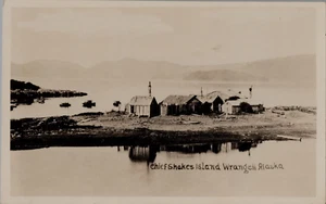 Buildings on Chief Shakes Island off Wrangell Alaska 1931 RPPC - Picture 1 of 2