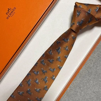Corbata Jacquard Seda Hermes Naranja Patrón Caballo 7cm Ancho Usada Foto 1 de 4