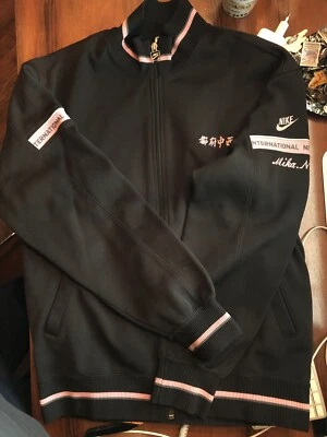 Vintage Nike International Blue Tag Black Track Jacket Pink Stripes MadeinJapan Foto 1 de 4