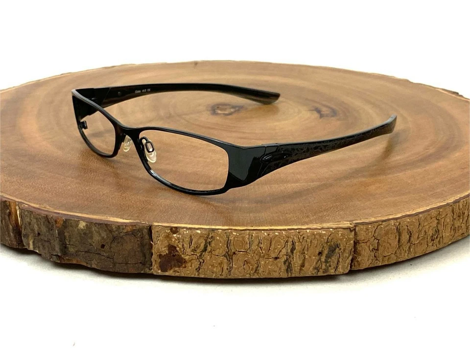 Marco de gafas Oakley Coto 4.0 titanio pulido negro rectangular 51 15 130 mm Foto 1 de 4