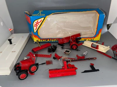 USSR RUSSIA tractor parts with box not sure if all parts are there - Image 1 of 2