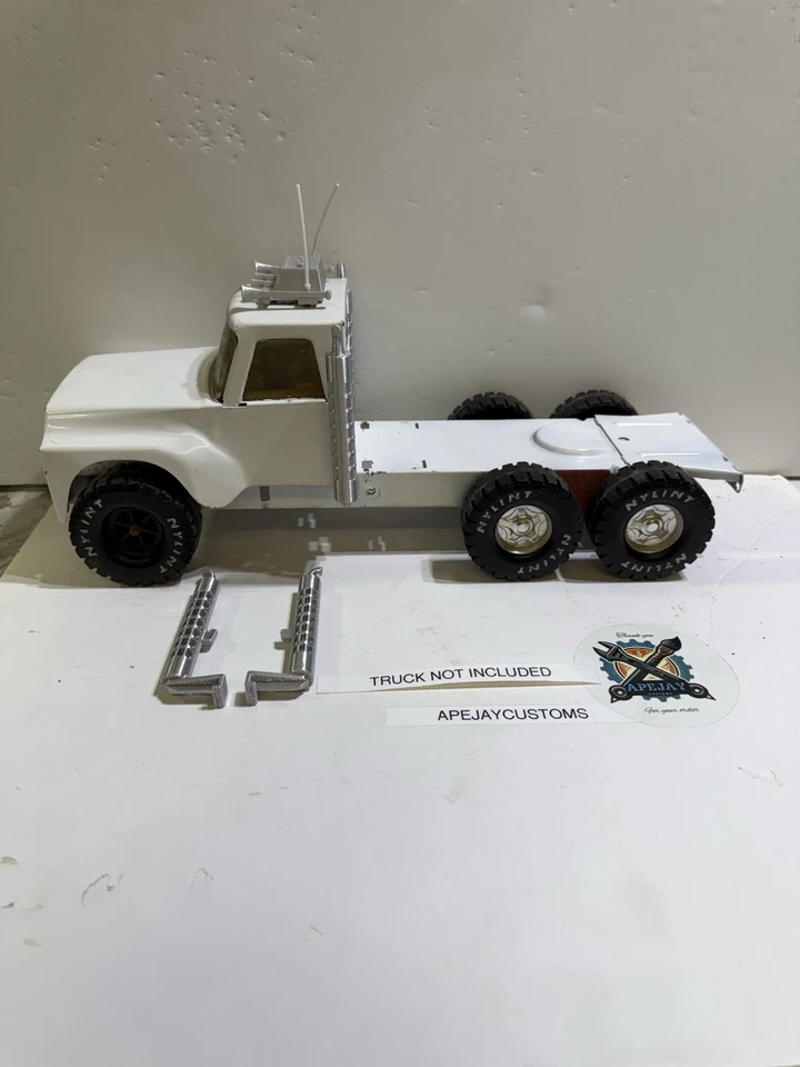 2 new silver  mufflers  Nylint  Pressed Steel semi tuck. Tractor trailer - Image 1 of 4