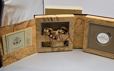 2004 US Mint Lewis & Clark 1oz.  Silver Coin W/Pouch Great Sioux, Standing Rock - Image 1 of 4