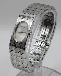 Reloj de cuarzo Christian Dior D70-100 esfera blanca cara ovalada plateada vintage usado - Imagen 1 de 9