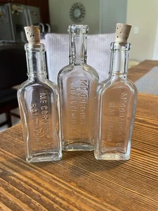 Vintage McCormick & Co Baltimora vetro pressato estratto goffrato bottiglia set 3 - Foto 1 di 9