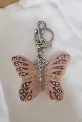 Llavero Coach Butterfly Bag Charm Foto 1 de 4