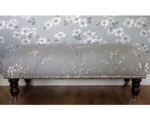 A new footstool in Laura Ashley Pussy Willow Steel upholstery fabric