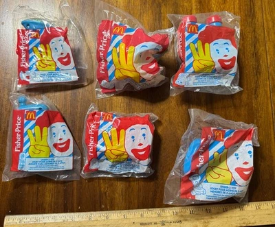 Lote 6 Fisher Price McDonald's Menos de 3 Juguetes Teléfono Trompeta Reloj Cortacésped Popper Foto 1 de 2