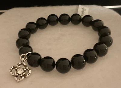 BRAZALETE ELÁSTICO BRILLANTE Y HERMOSO NUEVO CON ETIQUETAS CUENTAS NEGRAS + ENCANTO PRECIO DE VENTA SUGERIDO POR EL FABRICANTE $68 Foto 1 de 4