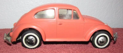 1959 Volkswagen Beetle Bug Dealers Promo Model Car - Salmon - Image 1 of 4