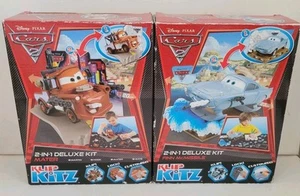 ®️ Disney Pixar Cars 2 Klip Kitz Mater & Finn McMissile di Klip Kitz - Nuovo - - Foto 1 di 13