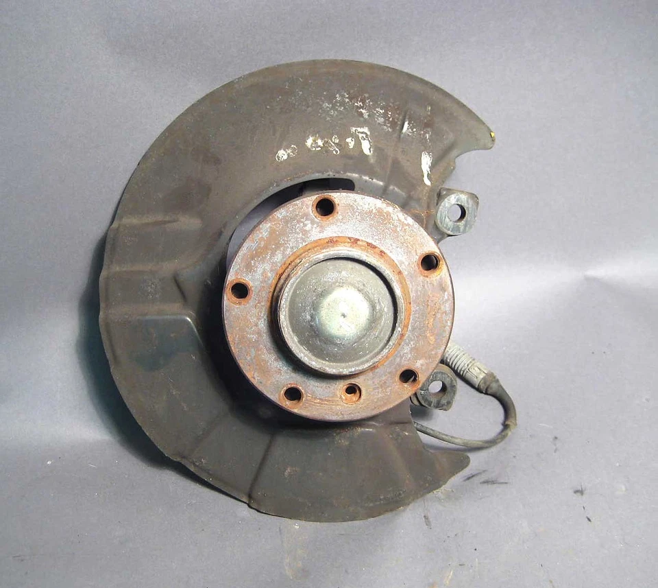 Buje de rueda delantera izquierda BMW E36 serie 3 Z3 cojinete de nudillo ABS 1992-1999 USADO OEM Foto 1 de 2