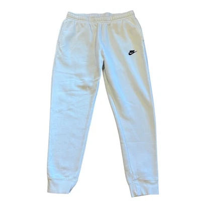 Pantalones deportivos Nike Sportswear Club para mujer talla grande blancos polar pierna cónica puños Foto 1 de 4