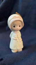 Precious Moments Ornament - Girl in coat with hands behind back