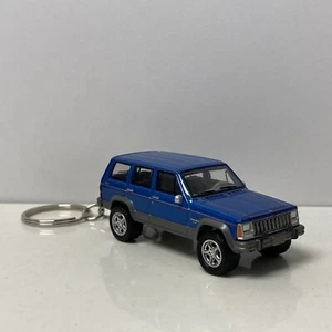RARE KEY CHAIN BLUE JEEP CHEROKEE XJ CUSTOM LIMITED EDITION 1984 1985 1986-1996 - Picture 1 of 2