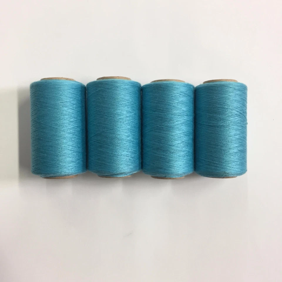 AQUA # 757 SPUN POLYESTER SERGER & QUILTING THREAD 4 TUBES 1000 YDS. EACH - Image 1 of 1