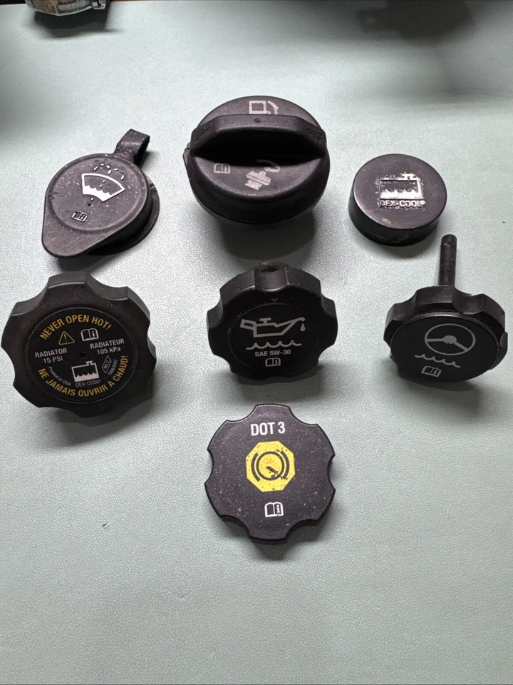 Chevy Trail Blazer 2003 tapa de llenado de aceite de fábrica tapa superior GM con otras tapas de fluido Foto 1 de 1