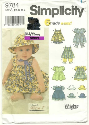 Babies' Dress Pinafore more Simplicity Sewing Pattern 9784 Size A XS,S,M,L UC FF - Image 1 of 4