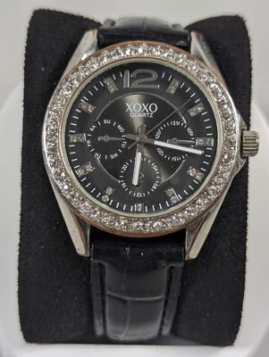 XOXO Woman Black Dial Crystal Accent Silver Tone Case Black Band Watch 8 Inch - Image 1 of 4