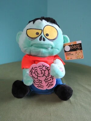 Peluche Gemmy Animated MUNCHING ZOMBIE 10" NUEVO CON ETIQUETAS Rite Aid exclusivo cerebros alimentarios Foto 1 de 4