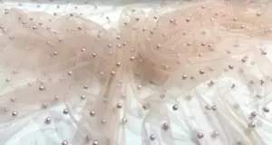 Blush Pearls Tulle Beads 52" Wide Bridal Veil Tulle fabric - Picture 1 of 1
