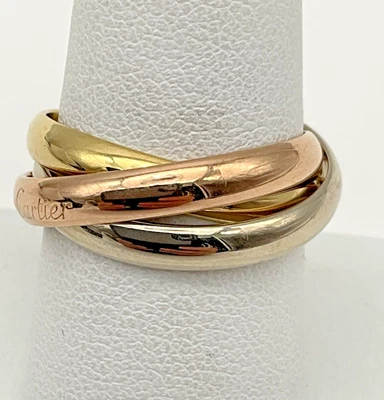 Banda/anillo Cartier de oro trinitario tricolor de 18 quilates Foto 1 de 4