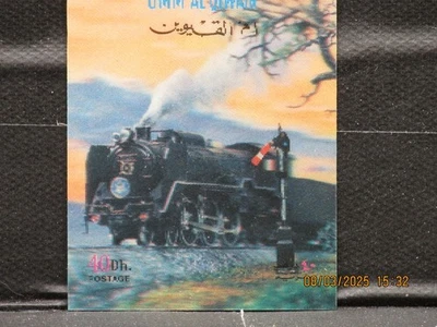 The listing is:(1) UMM AL QIWAIN - WORLD FAMOUS TRAIN 3D STAMP- VERY FINE-MNH - Image 1 of 4